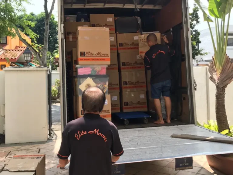 Elite Movers team unloading the truck filled with moving boxes