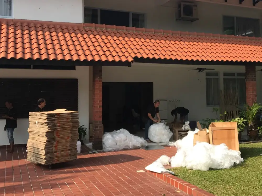 Elite Movers team finishing up a move at a landed home