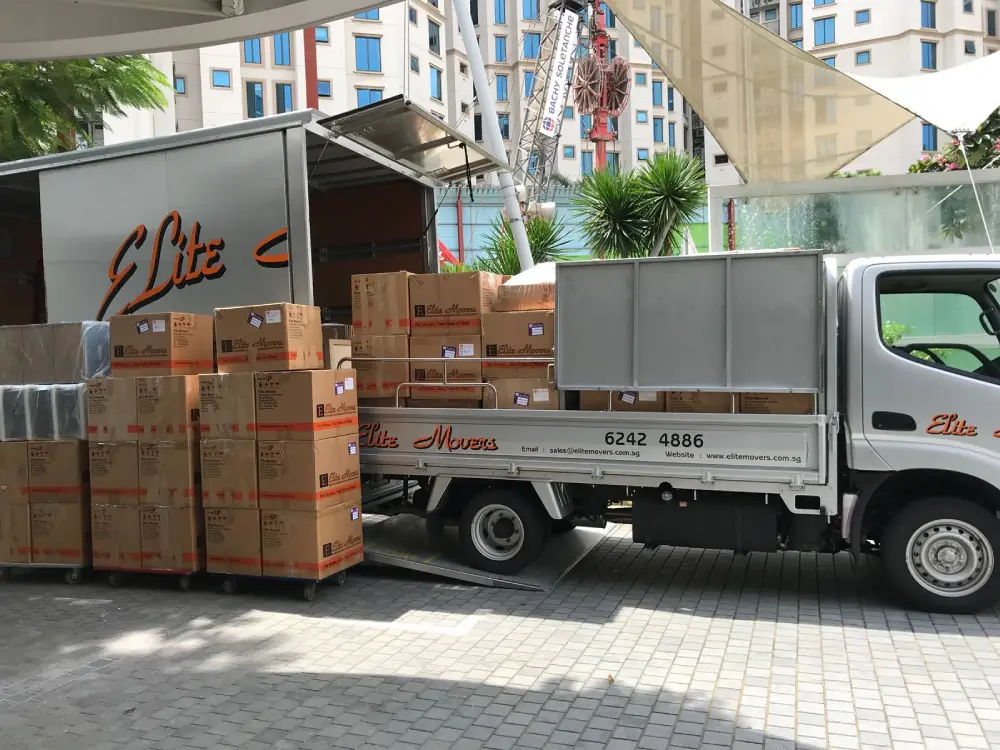 Moving with Elite Movers' lorry and truck with tail lift