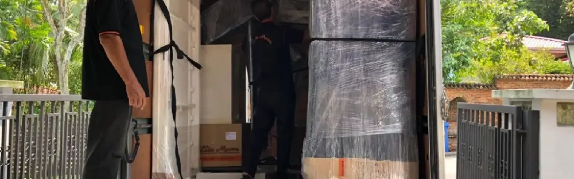 Loading up wrapped and protected items from customer's home onto the truck